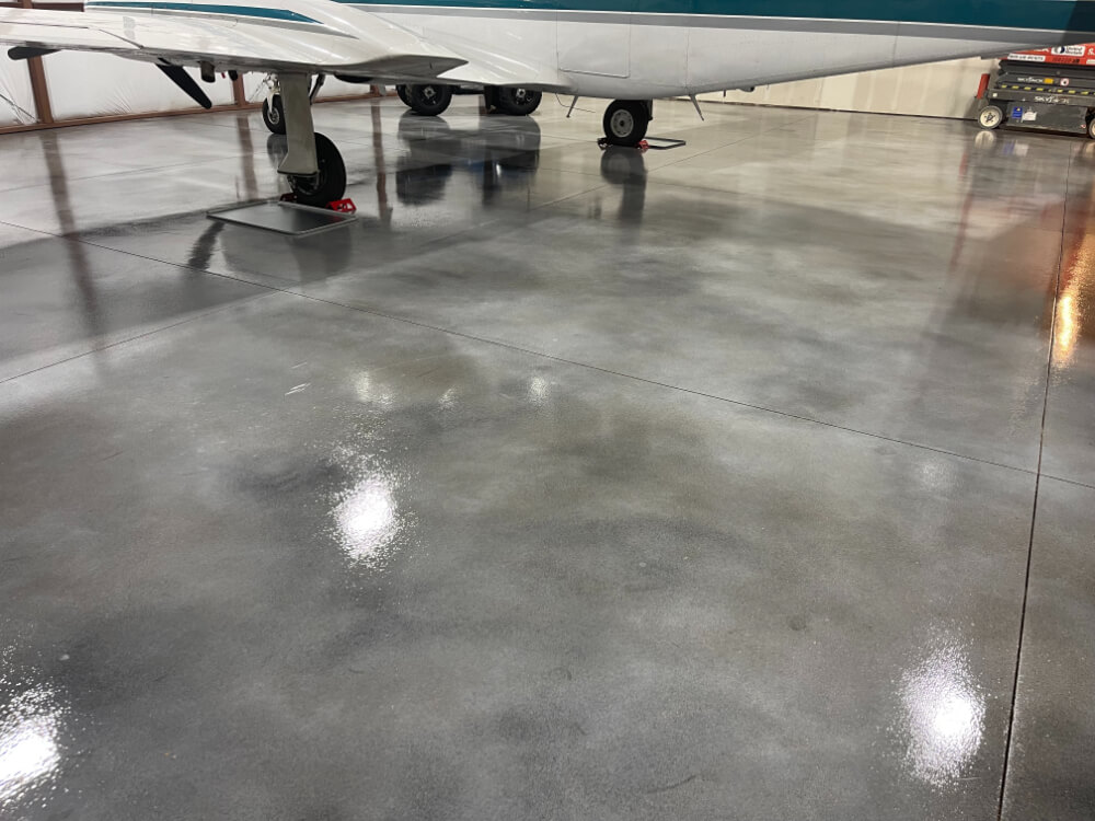 dye and seal with polyaspartic hangar Dye and Seal Mile High Coatings Northern Colorado